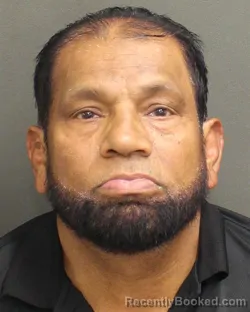 Mugshot of Mosharaf Hossain Bhuiyan booked in Orange County, Florida on October 2, 2026