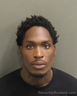 Mugshot of Travis Deshun Jr Jr Brown booked in Orange County, Florida on October 6, 2026