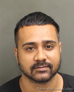 Mugshot of Shazad Raymond Rahman booked in Orange County, Florida on October 6, 2026