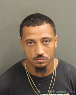 Mugshot of John Michael Bennett booked in Orange County, Florida on October 7, 2026