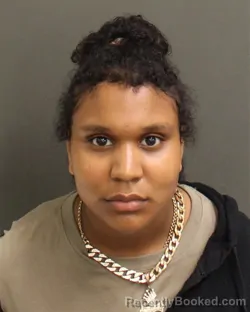 Mugshot of Latrisha Dawn Houllis booked in Orange County, Florida on October 7, 2026