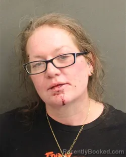 Mugshot of Kelly Marie Cook booked in Orange County, Florida on October 7, 2026