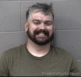 Mugshot of JUSTIN CHARLES WEAVER booked in Crawford County, Kansas on May 10, 2026