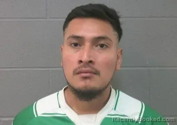 Mugshot of Emerson Nmi Barrios Oxlaj booked in Crawford County, Kansas on August 16, 2026