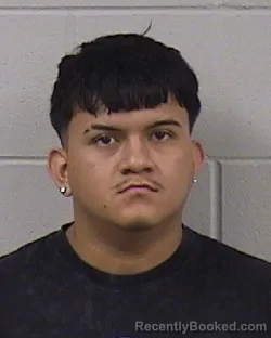 Mugshot of AMNER DAVID AREVALO-CRISPEN booked in Dickinson County, Kansas on July 9, 2026
