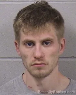 Mugshot of AUSTIN MICHAEL JOHNSON booked in Dickinson County, Kansas on April 18, 2026