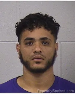 Mugshot of CRISTHIAN JOEL RASARIO SANTOS booked in Dickinson County, Kansas on June 26, 2026