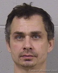 Mugshot of John Edwin Ruehlen booked in Dickinson County, Kansas on October 20, 2026
