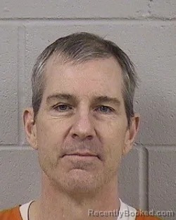 Mugshot of Travis Clasper booked in Dickinson County, Kansas on October 14, 2026
