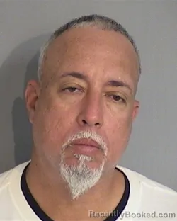 Mugshot of CARLOS MARCANO-SANTIAGO