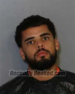 Mugshot of Carlos Adier Rodriguez-Rodriguez booked in Osceola County, Florida on August 12, 2026