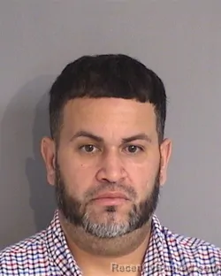 Mugshot of JONATHAN EMMANUEL NEGRON booked in Osceola County, Florida on July 4, 2026