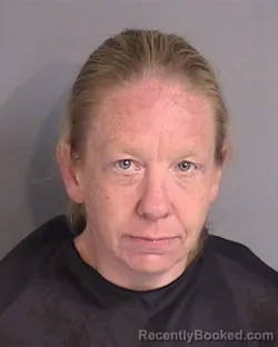 Mugshot of LESLIE JANE LATHAM booked in Osceola County, Florida on July 9, 2026