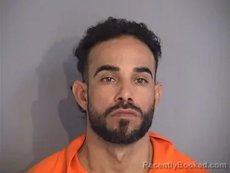 Mugshot of ANGEL SAMUEL SANTIAGO-HUERTAS booked in Osceola County, Florida on April 27, 2026