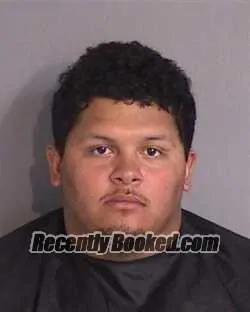 Mugshot of Justin Javier Santos booked in Osceola County, Florida on October 8, 2026