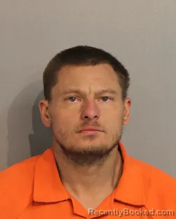 Mugshot of Joel Micah Lusader booked in Osceola County, Florida on September 24, 2026