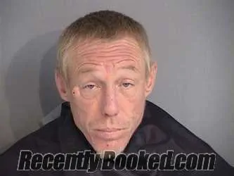 Mugshot of Mario William Burke booked in Osceola County, Florida on August 25, 2026