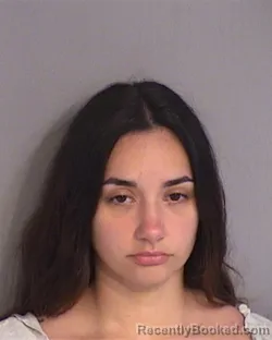 Mugshot of Denisse Chiquinquira Padron-Romero booked in Osceola County, Florida on August 14, 2026