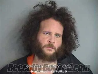 Mugshot of Jorge Omar Rosario-Dejesus booked in Osceola County, Florida on August 19, 2026