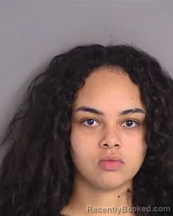 Mugshot of EMELY MERCEDES FLORES-ADAMES booked in Osceola County, Florida on May 21, 2026