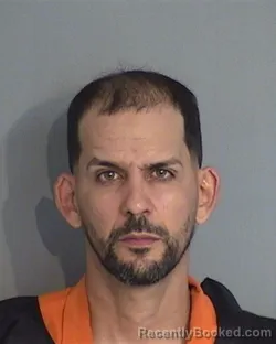 Mugshot of OMAR FIGUEROA-RIVERA booked in Osceola County, Florida on May 8, 2026