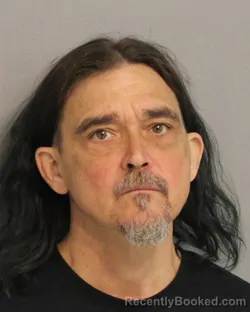 Mugshot of MICHAEL CHARLES-FRANCIS POWERS