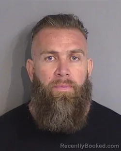 Mugshot of MAURICE ATIENZA-ACOSTA