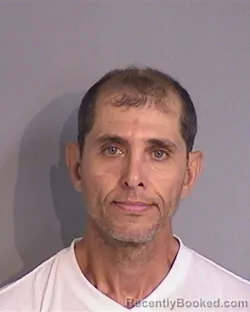 Mugshot of WILMAN A SANTA-CRUZ