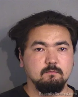 Mugshot of AIDIN KOZHOBEKOV