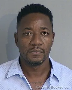 Mugshot of TOMAS JOSE NSANG-SILEBO booked in Osceola County, Florida on June 25, 2026