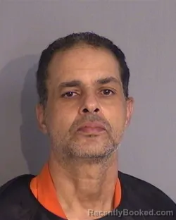 Mugshot of ISLAM MOHAMED-HAFEZ HATHOUT booked in Osceola County, Florida on May 8, 2026