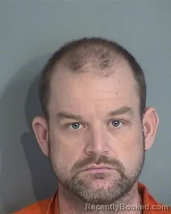 Mugshot of CHRISTOPHER LEE DAVIS booked in Osceola County, Florida on April 21, 2026