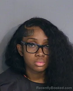 Mugshot of NEIKA ANAELLE STLOUIS booked in Osceola County, Florida on May 4, 2026