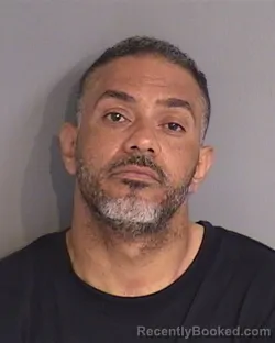 Mugshot of OSMEL JOSE GARCIA-JIMENEZ booked in Osceola County, Florida on May 9, 2026