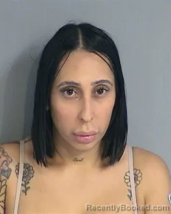 Mugshot of NICOLE MARIE MELENDEZ-SANTOS booked in Osceola County, Florida on June 20, 2026