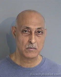 Mugshot of GAMAL KADER-HAMED HARIDY booked in Osceola County, Florida on May 14, 2026