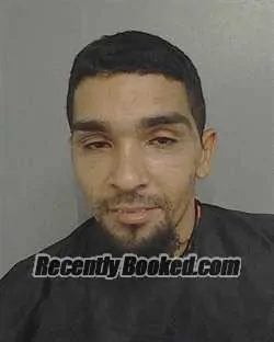 Mugshot of Angel Dario Ortiz booked in Osceola County, Florida on August 9, 2026