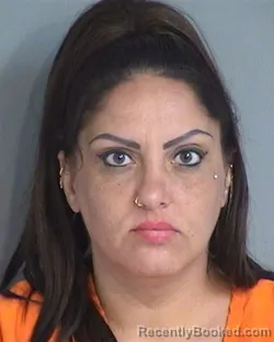 Mugshot of Michelle Lynn Martinez booked in Osceola County, Florida on October 4, 2026