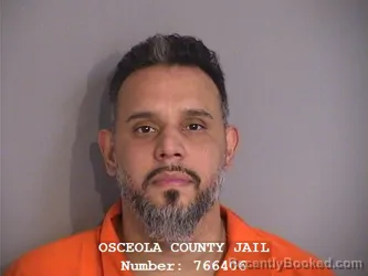 Mugshot of RAYNALDO MACHADO booked in Osceola County, Florida on April 8, 2026