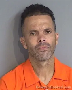Mugshot of KARLOS ROBERTO PEREZ-COLOM booked in Osceola County, Florida on May 19, 2026