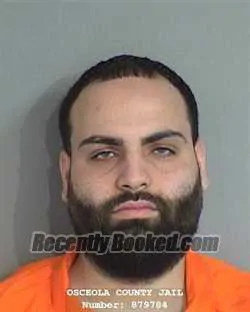 Mugshot of John Michael Torres-Colon booked in Osceola County, Florida on August 24, 2026