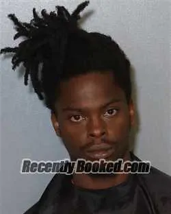 Mugshot of Travis Jevon Reynolds booked in Osceola County, Florida on August 21, 2026
