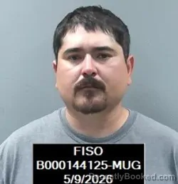 Mugshot of Matthew Pilar Flores booked in Finney County, Kansas on May 9, 2026