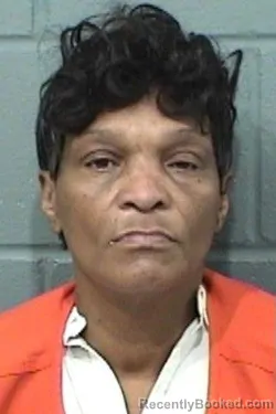 Mugshot of MYRTHLES LOUISE CRAWFORD