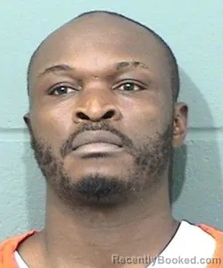 Mugshot of RICHARD NKETI JUNIOR TITA MUFUT booked in Geary County, Kansas on April 2, 2026