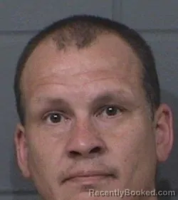 Mugshot of CHRISTOPHER SCOTT ASHE booked in Geary County, Kansas on July 10, 2026