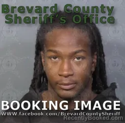 Mugshot of JA TAVIOUS
 DIONTE  MORRESSE BURRELL