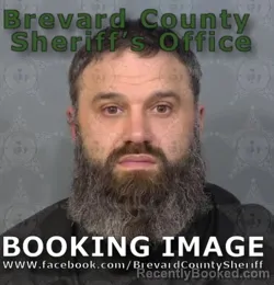 Mugshot of RYNE Adam Curry