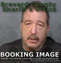 Mugshot of Carlo Aurora