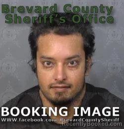 Mugshot of MARVIN MALCOLM DOOKHARAN